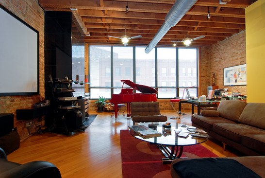 Loft living: An architect’s brick-and-timber space, priced at $565K